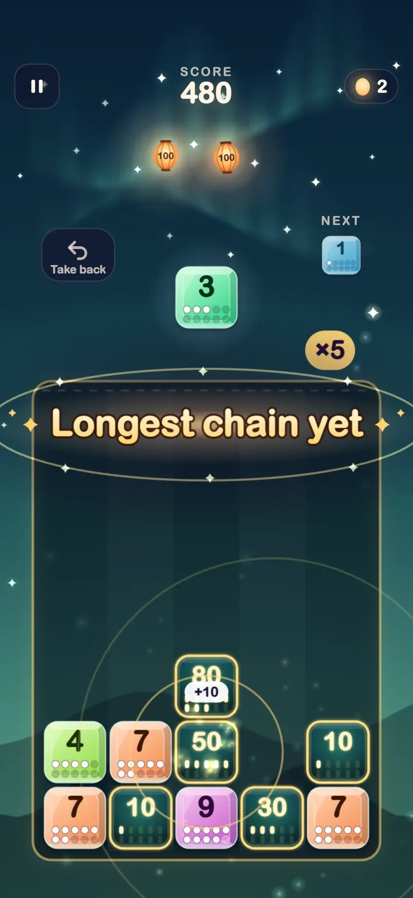 Tenrise under the Aurora sky: one drop sets off a chain of five, the counter shows ×5 and the game says Longest chain yet.